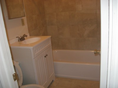 New Tub and ceramic tile surround